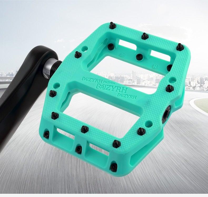 Stevvex ultralight flat bicycle pedals in turquoise nylon with non-slip pins on Tampa Home & Garden Store