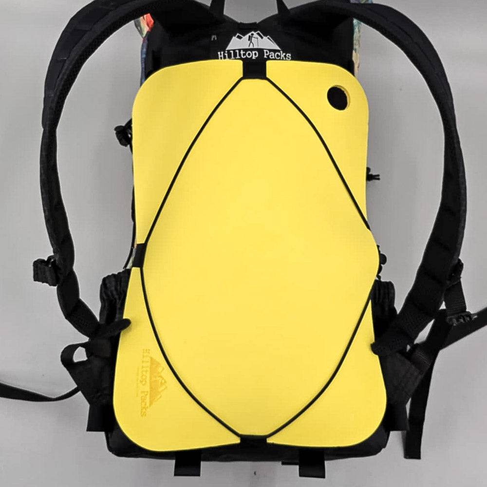 Ultralight Sit Pad yellow foam seat strapped to hiking pack with Hilltop Packs logo on Tampa Home & Garden Store