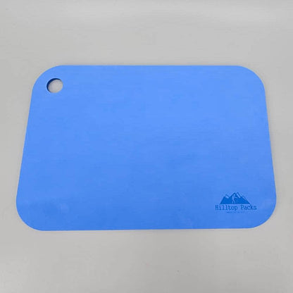 Ultralight Sit Pad blue foam seat with corner hole by Hilltop Packs LLC for camping & hiking on Tampa Home & Garden Store