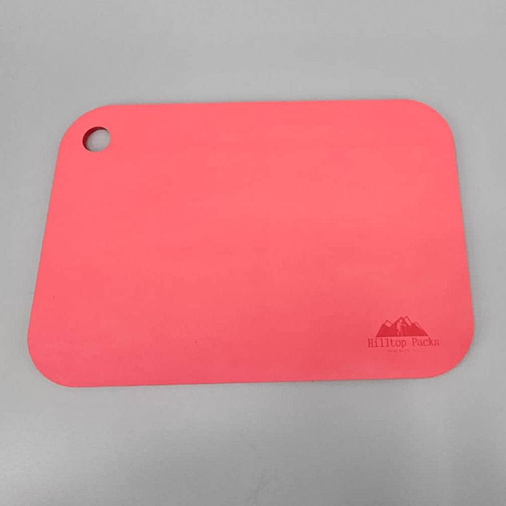 Ultralight Sit Pad, coral pink foam seat for backpacking, hole in corner, Hilltop Packs LLC on Tampa Home & Garden Store