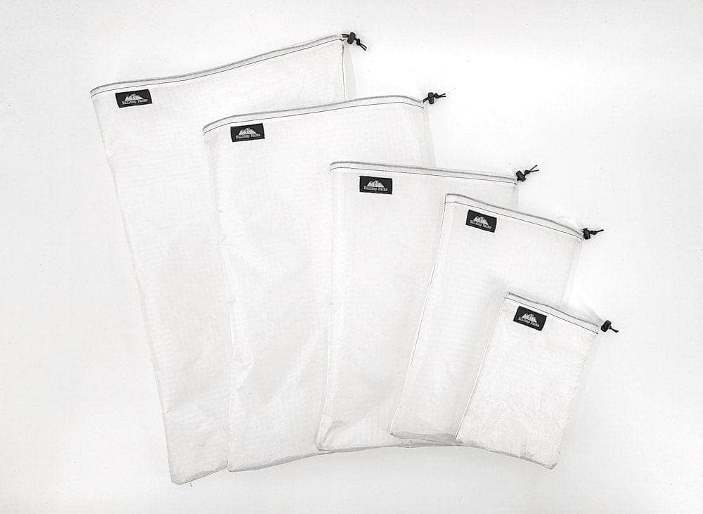 Six ultralight stuff sacks (D50T fabric gear organizer) in white with Hilltop Packs LLC logos on Tampa Home & Garden Store