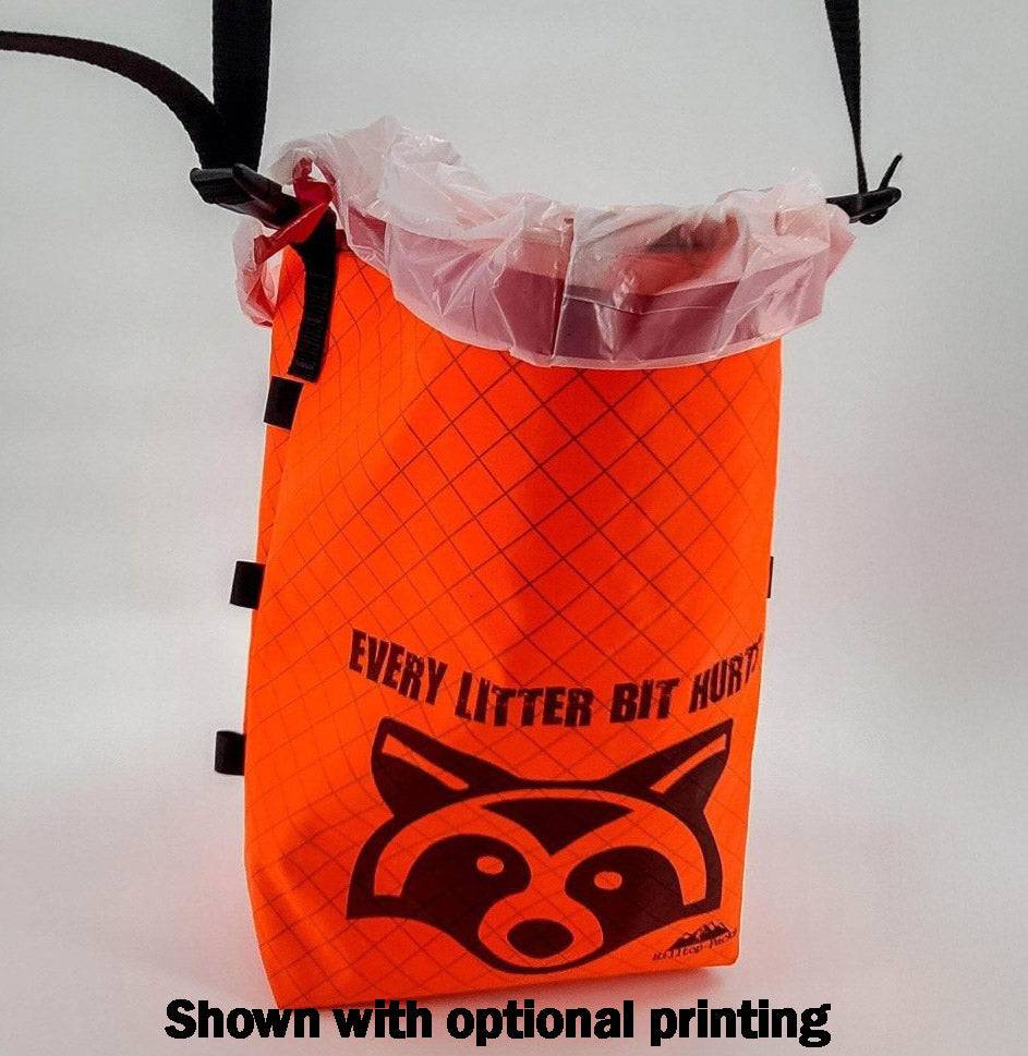 Ultralight trail trash bag in bright orange ECOPAK Pack-Out system with raccoon logo on Tampa Home & Garden Store