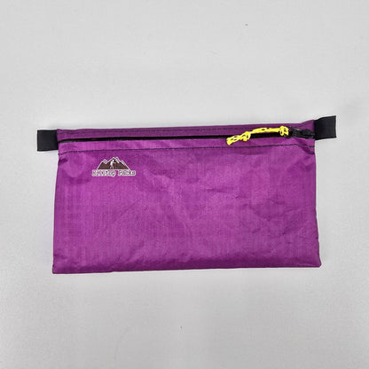 Ultralight zipper pouch Series 1 purple nylon with yellow paracord pull Hilltop Packs logo on Tampa Home & Garden Store