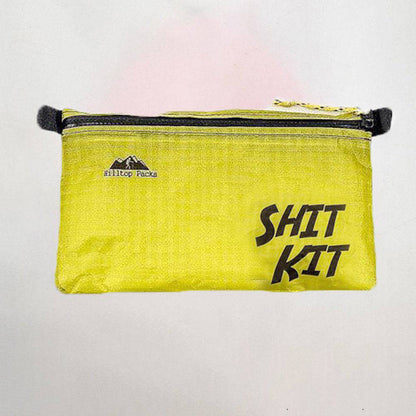 Ultralight travel pouch in yellow with black zipper, SHIT KIT print and Hilltop Packs logo on Tampa Home & Garden Store