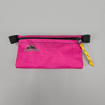 Ultralight Zipper Pouch pink pouch with black zipper and yellow pull Hilltop Packs logo on Tampa Home & Garden Store