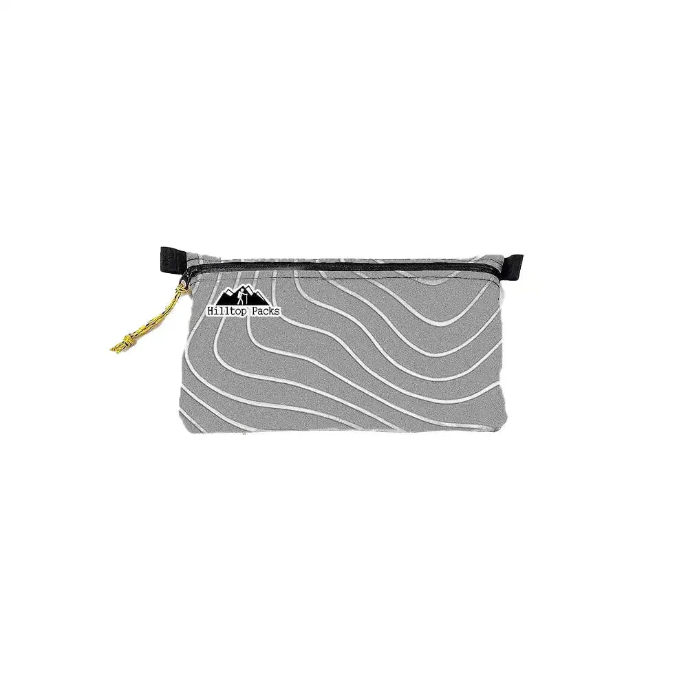 Gray ultralight zipper pouch with white wave pattern and Hilltop Packs paracord pull on Tampa Home & Garden Store