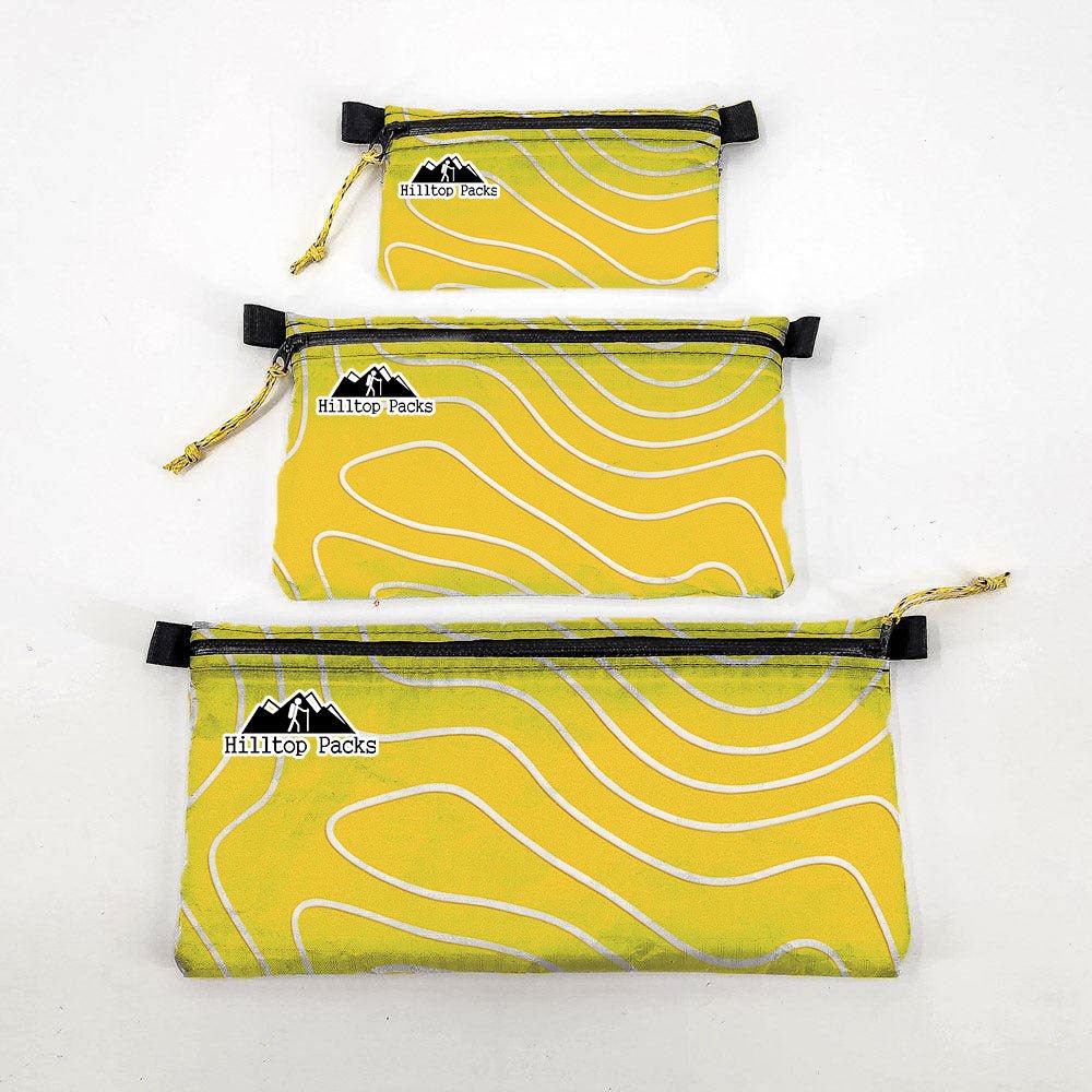 Ultralight Zipper Pouch Organizer Series 3-pack yellow pouches with contour lines Hilltop logo on Tampa Home & Garden Store
