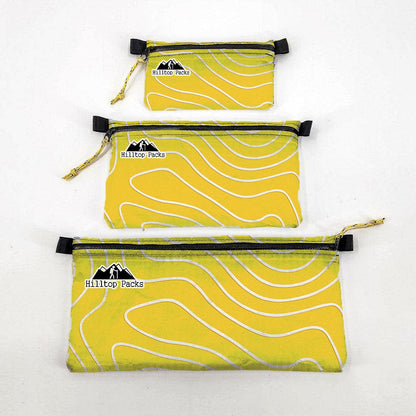 Ultralight Zipper Pouch Organizer Series 3-pack yellow pouches with contour lines Hilltop logo on Tampa Home & Garden Store