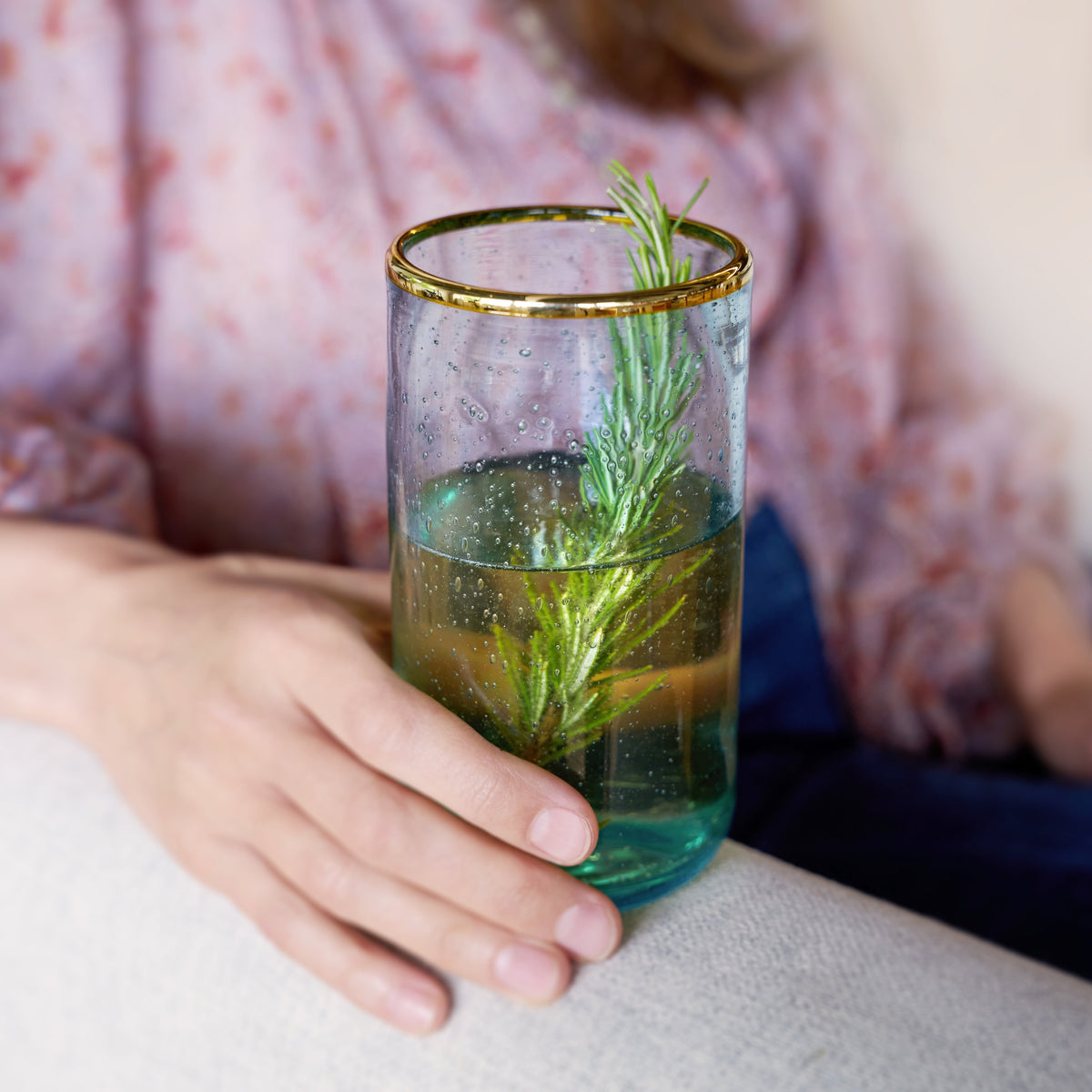 Aqua Bubble Glass Tumbler Set by Twine Living with gold rim, clear glass, rosemary garnish on Tampa Home & Garden Store
