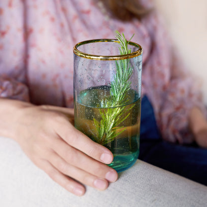 Aqua Bubble Glass Tumbler Set by Twine Living with gold rim, clear glass, rosemary garnish on Tampa Home & Garden Store