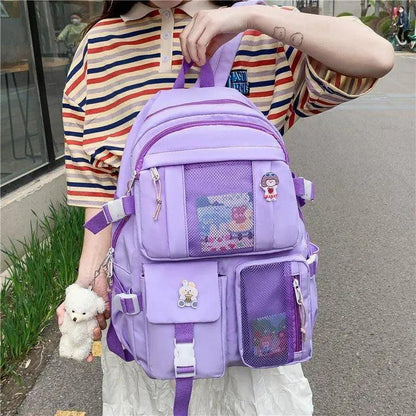 Backpack lavender multi-pocket school bag with mesh front pocket and plush teddy keychain on Tampa Home & Garden Store