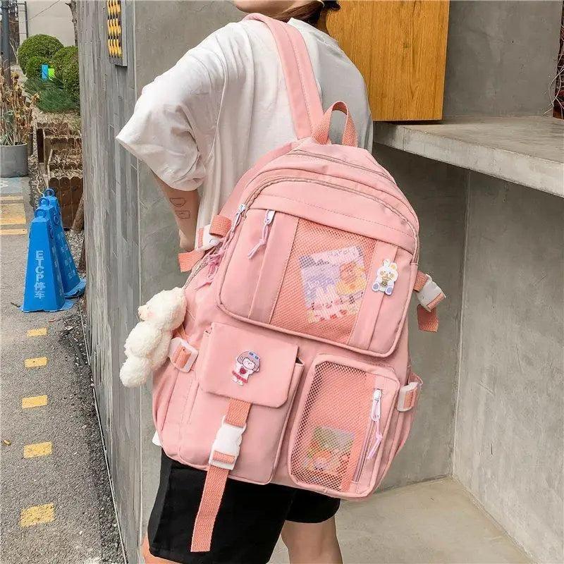 Stevvex pink backpack with large capacity, multiple pockets and mesh front pocket on Tampa Home & Garden Store