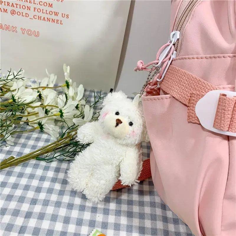 Stevvex ALU92981RST pink multi-pocket school backpack and white teddy bear keychain on Tampa Home & Garden Store