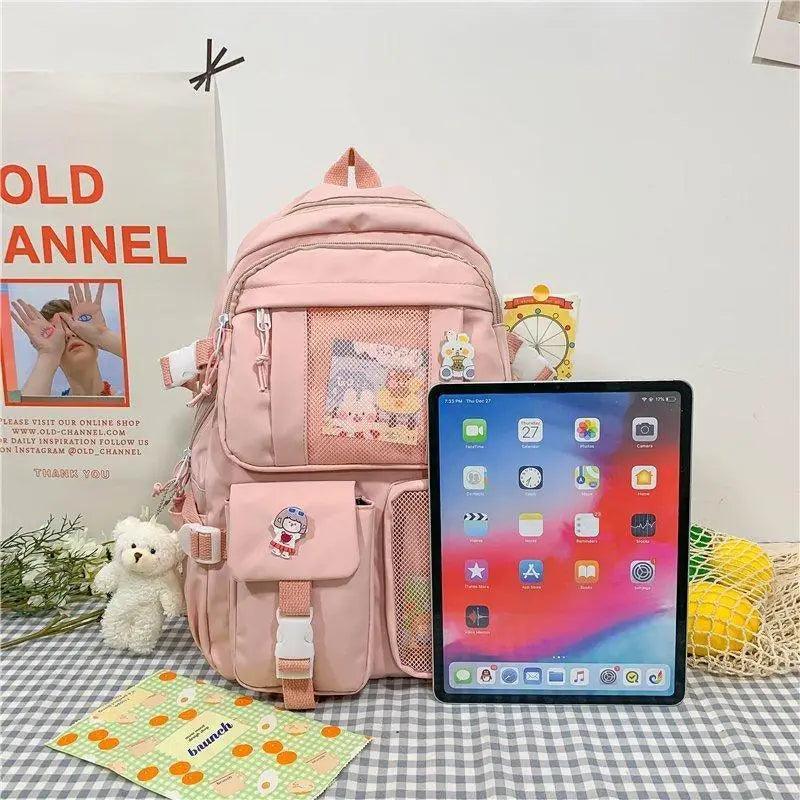 Pink waterproof multi-pocket school backpack Stevvex ALU92981RST with mesh pockets on Tampa Home & Garden Store