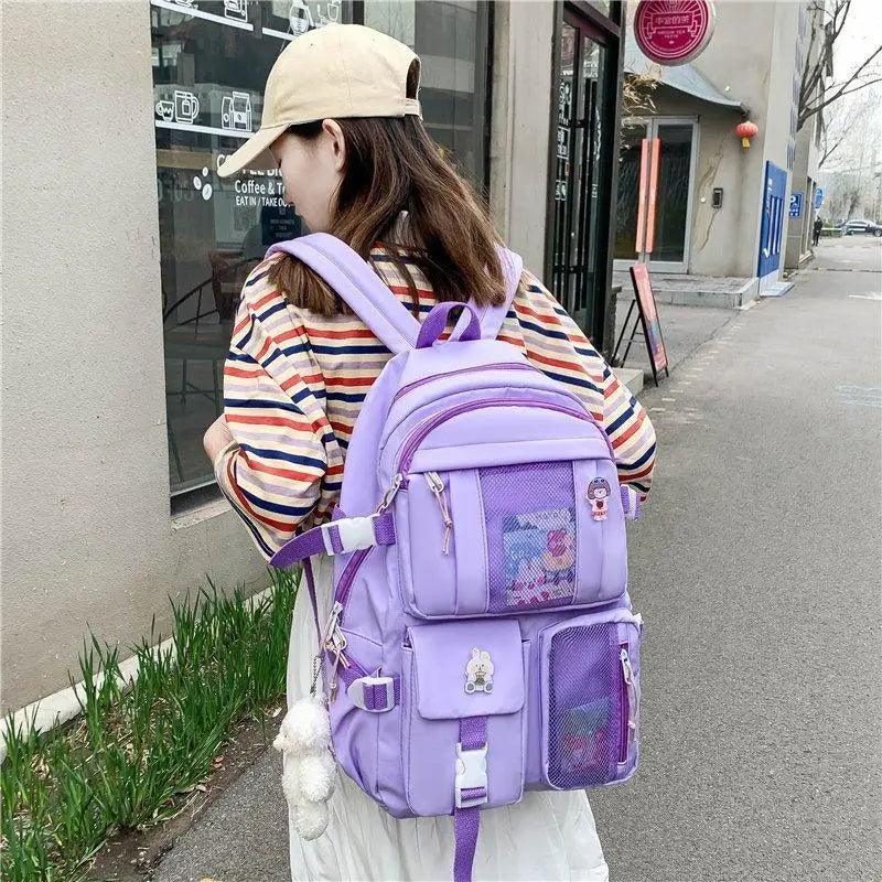 Stevvex ALU92981RST large-capacity purple multi-pocket school backpack with mesh side pockets on Tampa Home & Garden Store