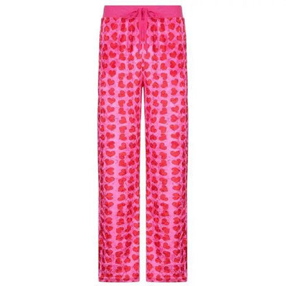 Pink heart-print pajama pants with drawstring waist for women on Tampa Home & Garden Store