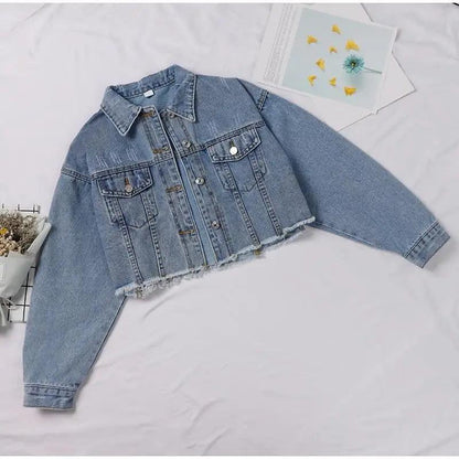 Women's cropped denim trucker jacket with front pockets and frayed hem in light wash by Stevvex on Tampa Home & Garden Store