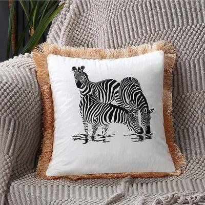 Stevvex zebra print cushion cover, polyester with black zebra motif and tan tassel edge on Tampa Home & Garden Store