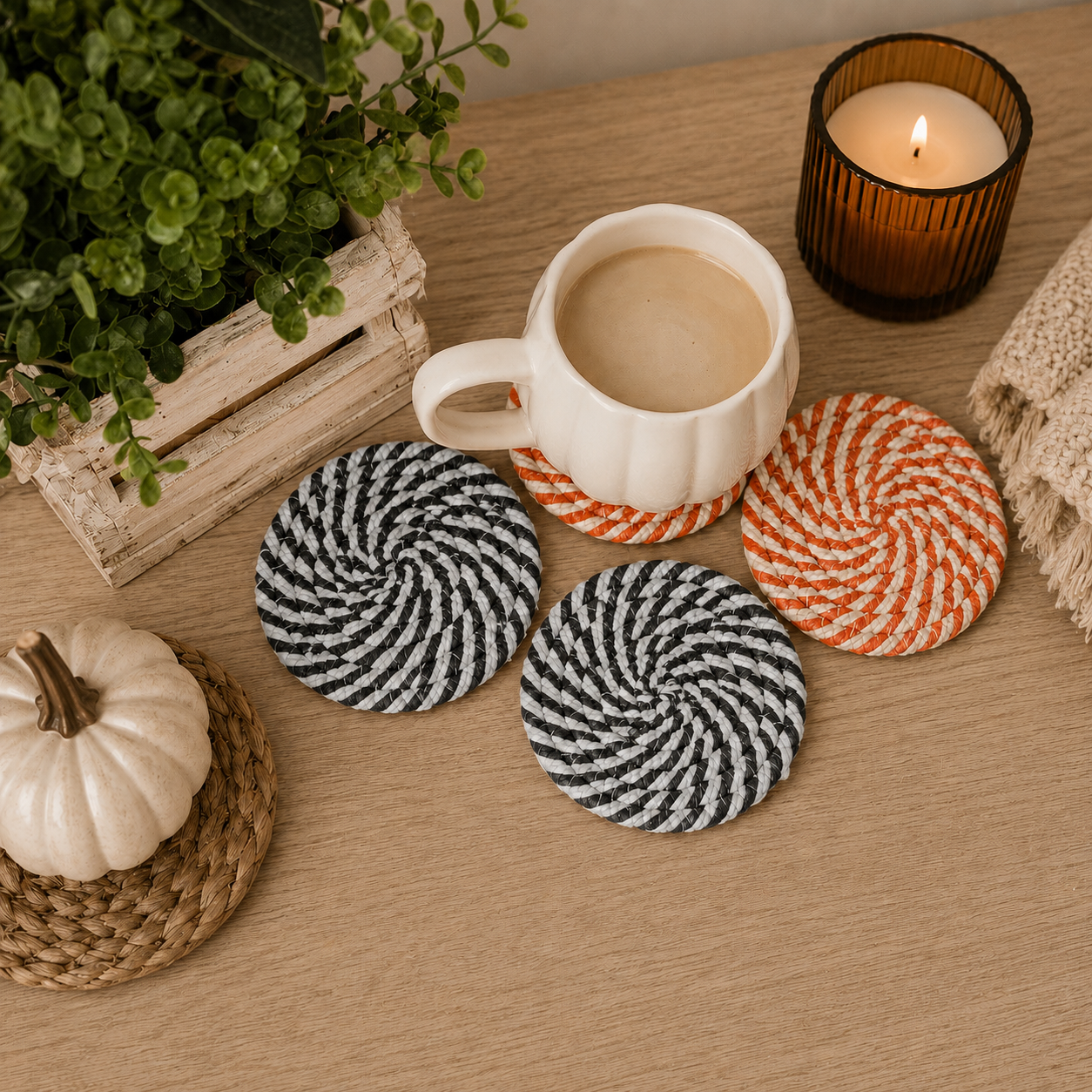Gia Roma Fall Fabric Coasters 3 rope-pattern coasters in black/white and orange beside a white mug on Tampa Home & Garden Store