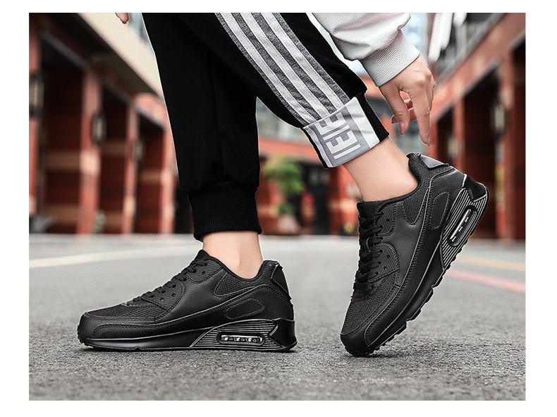 Stevvex pair of unisex air cushion sneakers black lace-up athletic running shoes on Tampa Home & Garden Store