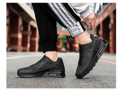 Stevvex pair of unisex air cushion sneakers black lace-up athletic running shoes on Tampa Home & Garden Store