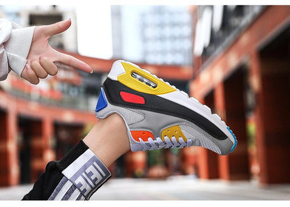 Stevvex unisex air cushion sneakers with colorful paneling, white sole and lace-up design on Tampa Home & Garden Store