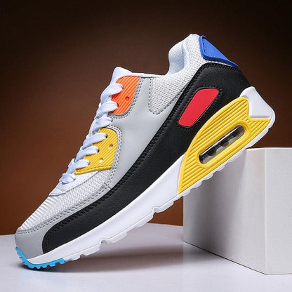 Unisex air cushion sneakers with white mesh, black overlays, yellow accents and lace-up design on Tampa Home & Garden Store