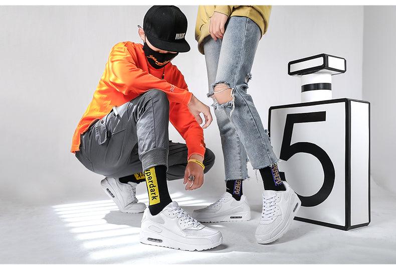 Stevvex Unisex Air Cushion Sneakers white lace-up casual athletic footwear shown on two wearers on Tampa Home & Garden Store