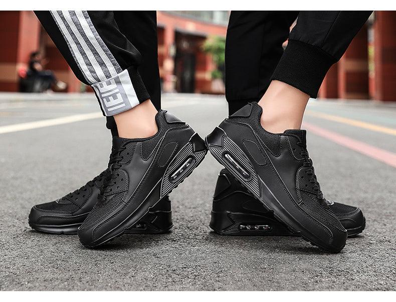 Pair of Stevvex unisex black air cushion sneakers with lace up and visible sole detail on Tampa Home & Garden Store