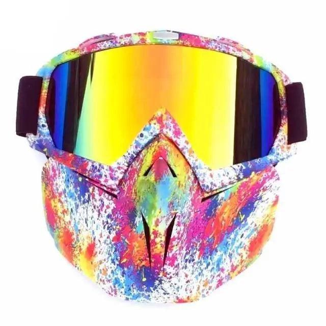 Stevvex snowboard goggles with colorful paint-splatter frame and mirrored yellow lenses on Tampa Home & Garden Store