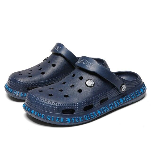 Stevvex unisex navy blue slip-on water clogs with ventilated upper and adjustable strap on Tampa Home & Garden Store