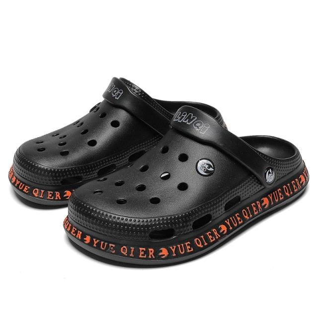 Stevvex unisex slip-on sandals with breathable perforated upper and orange sole text on Tampa Home & Garden Store