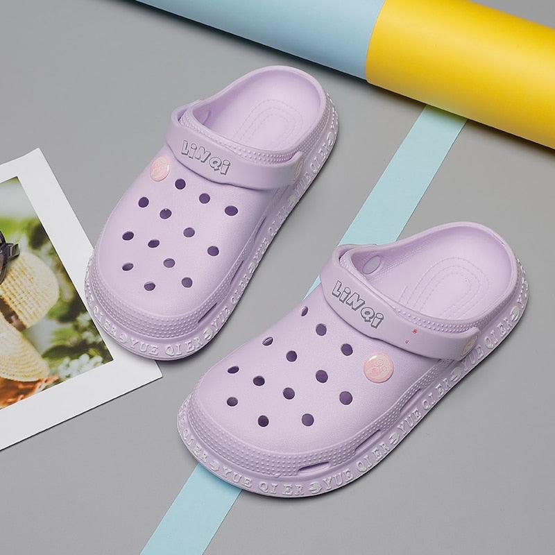 2 lavender Stevvex unisex summer sandals with perforated uppers and strap closure on Tampa Home & Garden Store