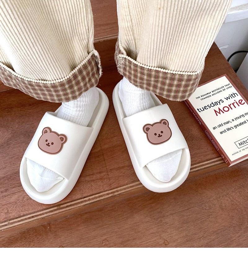 Stevvex unisex thick‑sole slides for beach and pool, white pair with brown bear face patches on Tampa Home & Garden Store
