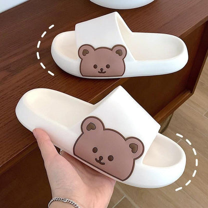Unisex thick-sole Stevvex slides in white with brown bear graphic on strap on Tampa Home & Garden Store
