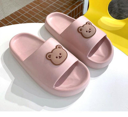 Unisex pink thick-sole slides with bear emblem, Stevvex sandals for beach and pool, two slides on Tampa Home & Garden Store
