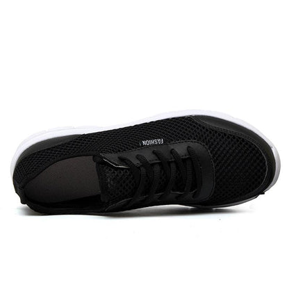 Unisex black mesh sneakers with lace-up closure, breathable lightweight casual walking shoes on Tampa Home & Garden Store