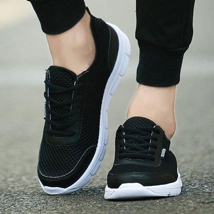 Unisex Stevvex black mesh sneakers with white outsole for casual summer wear on Tampa Home & Garden Store