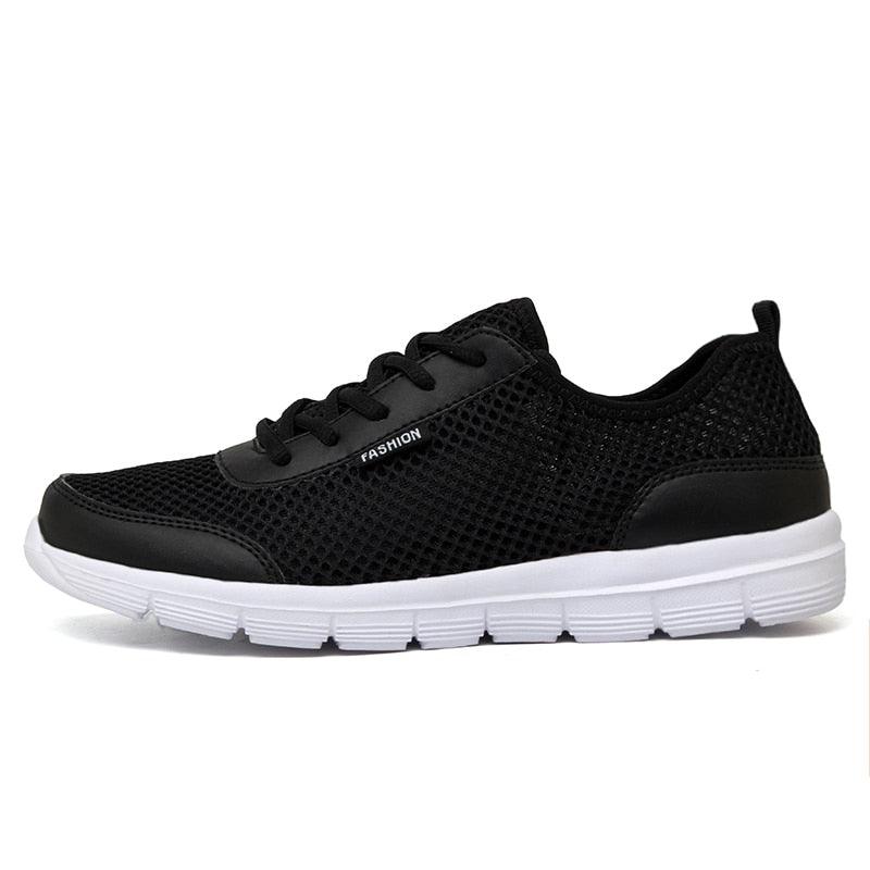 Unisex Stevvex breathable black mesh sneakers with lace-up front and white sole on Tampa Home & Garden Store