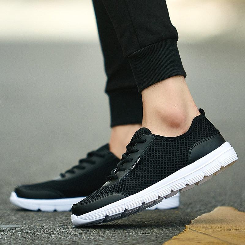 Stevvex unisex black mesh sneakers with white sole lace-up casual walking footwear on Tampa Home & Garden Store