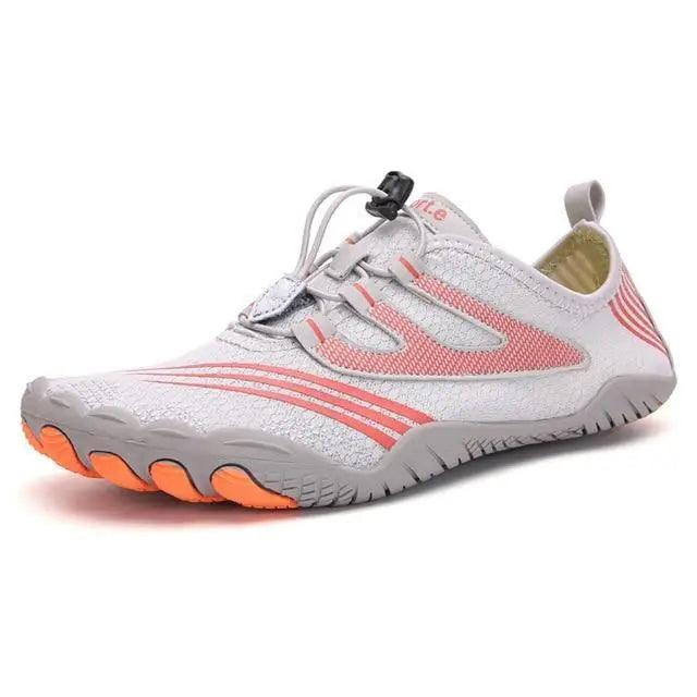 Stevvex unisex athletic sneakers grey with pink accents non-slip orange outsole on Tampa Home & Garden Store
