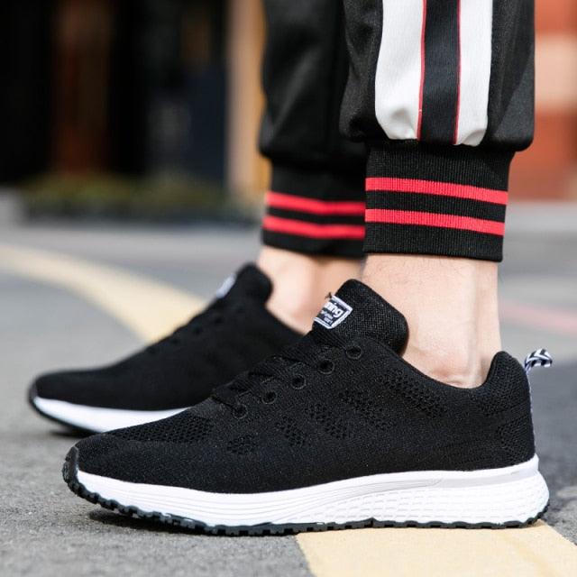 Stevvex unisex black mesh sneakers with white midsole and black outsole on Tampa Home & Garden Store