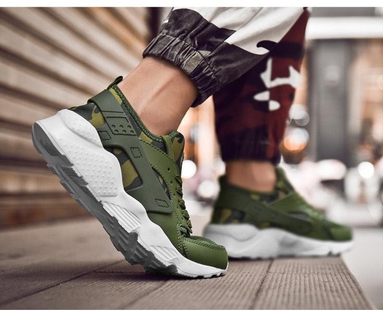 Camouflage green sneakers with a white chunky sole, lace-up athletic trainers on Tampa Home & Garden Store