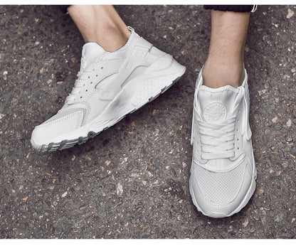 Stevvex unisex white mesh sneakers pair for running casual sport shoes on Tampa Home & Garden Store