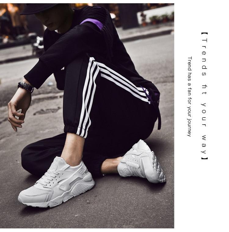 Unisex white Stevvex mesh sneakers for running and casual wear, modern sporty design on Tampa Home & Garden Store