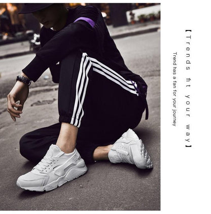 Unisex white Stevvex mesh sneakers for running and casual wear, modern sporty design on Tampa Home & Garden Store