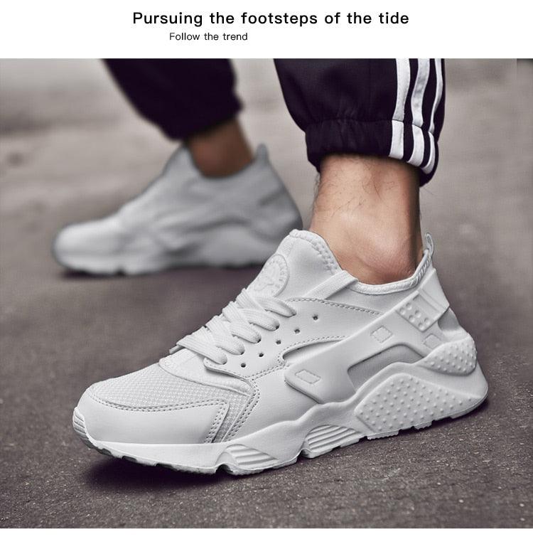 Unisex white Stevvex sneakers with mesh upper and chunky sole for casual running on Tampa Home & Garden Store
