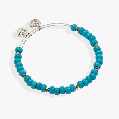 Untamed turquoise beaded bangle with silver-wire band and Alex and Ani disc charms on Tampa Home & Garden Store