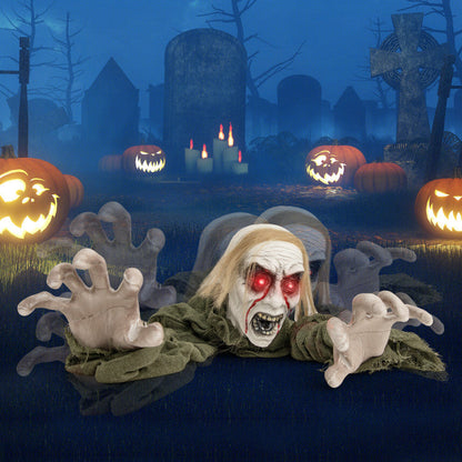 Halloween Groundbreaker climbing zombie inflatable by DirectDeals with red eyes and torn cloak on Tampa Home & Garden Store
