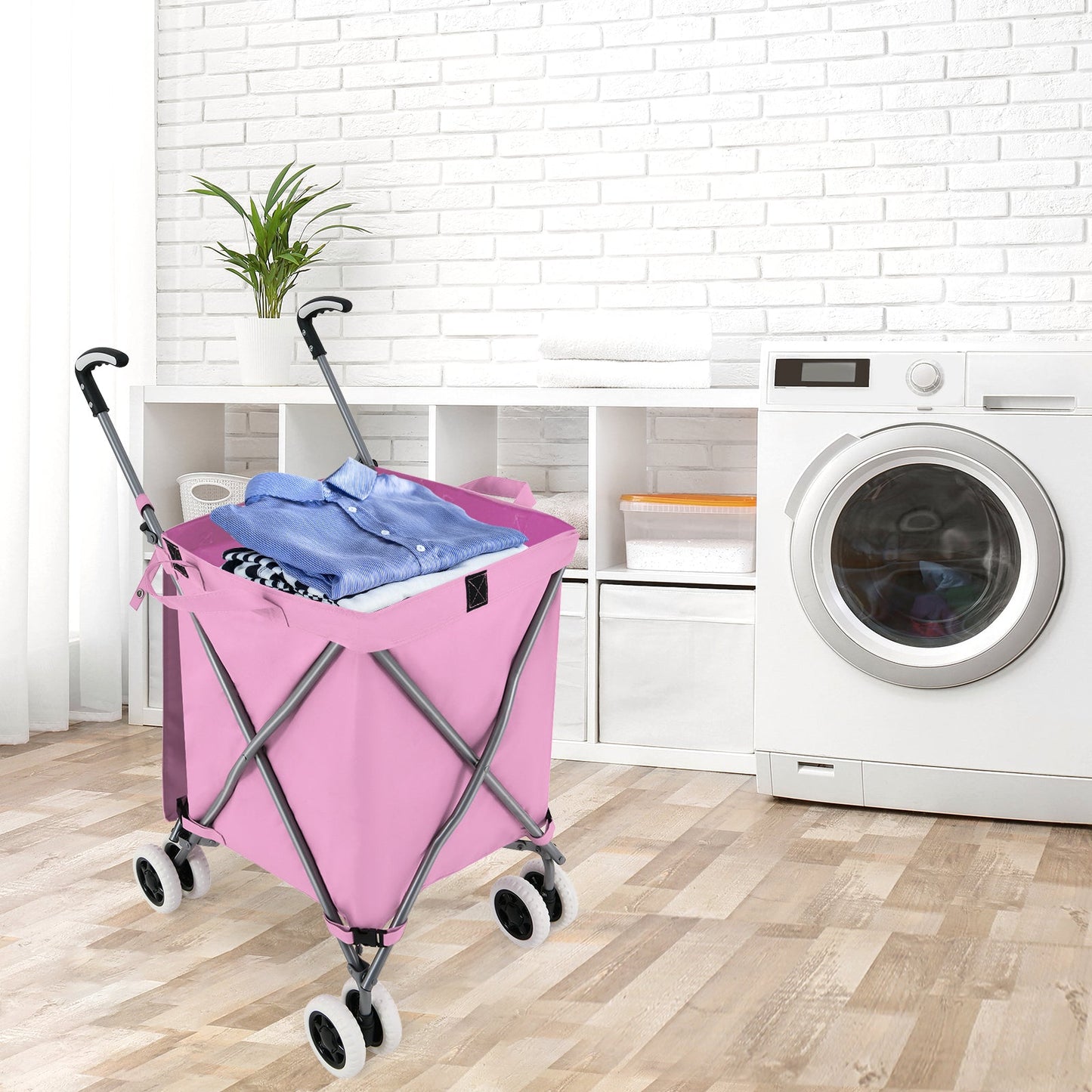 pink rolling laundry cart filled with clothes beside a washer in a laundry room on Tampa Home & Garden Store